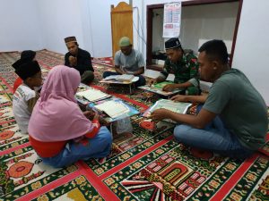 Satgas TMMD Ajarkan Mengaji Anak-anak Desa Sungai Ning