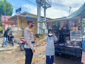 Polres Merangin Berikan Himbauan Prokes dan Bagi Masker Gratis