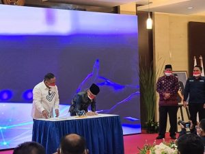 Bupati Adirozal Tanda Tangan MoU Dengan BP2MI