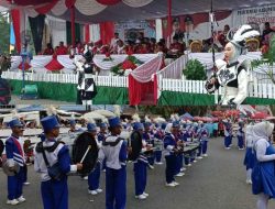 Tampil Konsisten, Drumband SMPN 4 Tanah Sepenggal Tuai Pujian Pawai HUT RI Ke 81